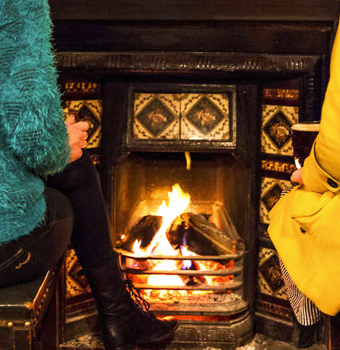 Cosy Up in Pubs with Roaring Fires